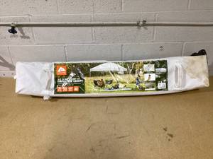 lot 346 image: Ozark Trail 10x10 Instant Pop Up Canopy Tent with Simple Push Setup