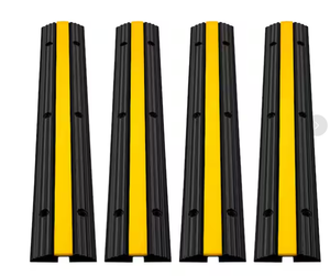 lot 306 image: 1-Channel Rubber Cable Protector Ramps 22046 lbs. Loading Cable Wire Cord Cover Speed Bump (4-Pieces)