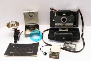 lot 42 image: Vintage Polaroid Automatic 100 Land Camera with Accessories