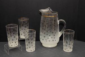 lot 50 image: Vintage Mid-Century Glass Pitcher & 4 Drinking Glasses  Starburst Design