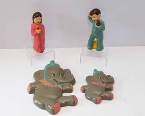 lot 56 image: Set of 4 Hand-Painted Figurines  Elephants and Boy & Girl