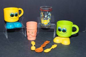 lot 69 image: Vintage 1970s Cup & Mug Collection  Deka, Captain Kangaroo, Archie, Zoopals & More