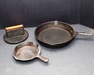lot 110 image: Set of 2 Cast Iron Pans & Cast Iron Charcoal Companion Press