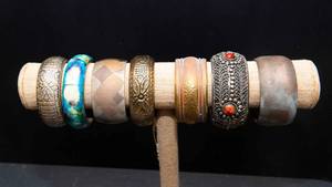 lot 142 image: Set of Seven Large Chunky Metal Bangles