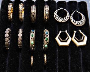 lot 90 image: Set of Seven Boho Hoop Earrings