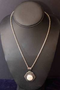 lot 28 image: Vintage Sterling Moon Face Pendant with Silver-Tone Chain