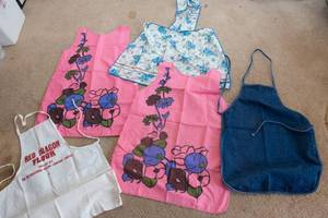 lot 194 image: Set of Five Vintage Aprons