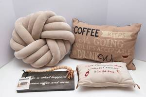 lot 200 image: Wine-Themed Pillows and Wall Art