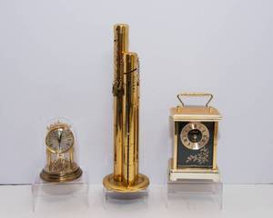 lot 294 image: Two Small Clocks and Coin Sorter