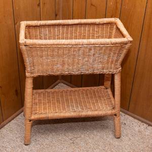 lot 287 image: Wicker Planter  22.5 W x 10 D x 28 T
