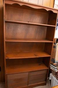 lot 431 image: Wooden Bookshelf with Sliding Doors  35W x 62T x 12D