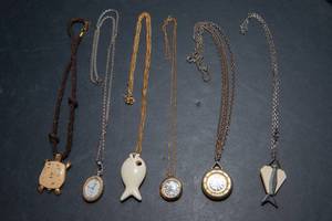 lot 554 image: Set of Six Necklaces - Stone, Compass and Clock