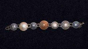 lot 558 image: Unique Vintage Coin Bracelet
