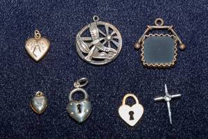 lot 550 image: Set of Seven Pendants  One Sterling Silver Cross