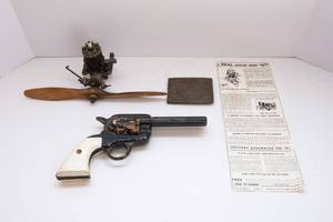lot 467 image: Assorted Collectibles  Belt Buckle, Wooden Toy Gun, Mini Engine