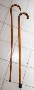 lot 552 image: Set of Two Canes  Smooth & Bamboo-Style
