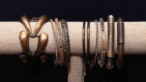 lot 428 image: Set of 9 Metal Bangles