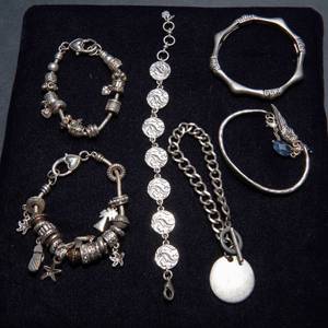 lot 417 image: Set of 6 Silver-Tone Bracelets