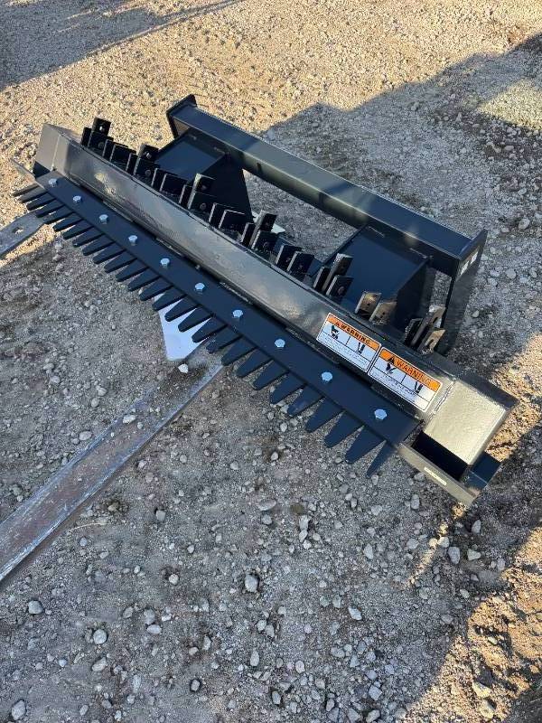lot 31 image: Unused 2025 WOLVERINE Skid Steer Ripper Attachment
