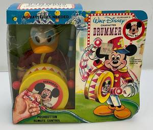 lot 5 image: Vintage 1980s Durham Donald Duck Drummer Member Mickey Mouse Club With Push Button Remote Control Made In Hong Kong (New Old Stock In Original Box)