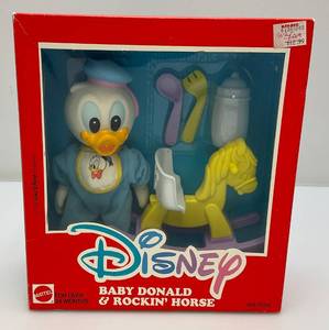 lot 10 image: Vintage Walt Disney Baby Donald & Rockin Horse