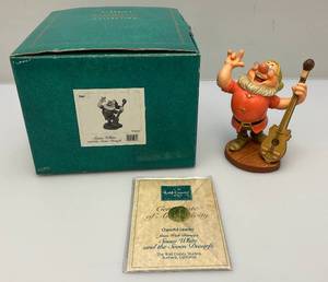 lot 57 image: Vintage WDCC Cheerful Leader) Snow White And The Seven Dwarfs (DOC) Figurine In Original Box With COA