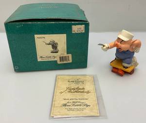 lot 63 image: Est. $145.00- $185.00 Vintage WDCC  (Work And Play Dont Mix ) Three Little Pigs (Practical Pig) Figurines In Original Box With COA
