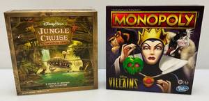 lot 101 image: Collectible DISNEY Games Including Villains Monopoly And Disney Parks Jungle Cruise Adventure Game (NIB)