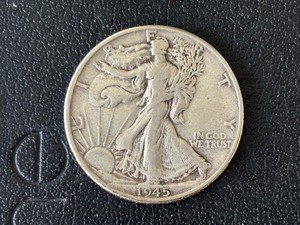 lot 52 image: 1945 Walking Liberty Half Dollar