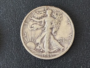 lot 54 image: 1945-D Walking Liberty Half Dollar