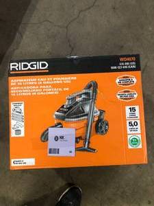 lot 56 image: RIDGID 4 Gal. 5.0 Peak HP Portable Shop Vacuum Wet Dry Vac with Fine Dust Filter, Locking Hose and Attachments WD4070   Customer Returns See Pictures