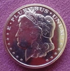 lot 1 image: Morgan Style 1 Oz. Copper Round