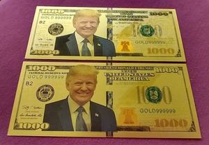 lot 34 image: (2) Donald Trump Gold Foil Novelty Notes