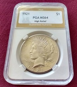lot 54 image: 1921 Peace Dollar - PGA MS64 - Wow