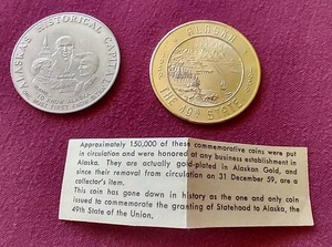 lot 59 image: (2) Vintage Alaska Trade Tokens