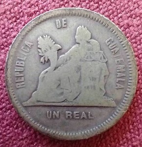 lot 66 image: 1889 Guatemala Silver One Real Coin