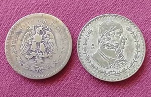 lot 69 image: (2) Vintage Mexico Part Silver Peso Coins