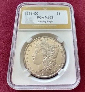 lot 81 image: 1891-CC Spitting Eagle Morgan Dollar - PGA MS62