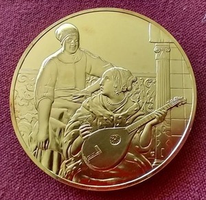 lot 101 image: Large Sterling Silver 100 Greatest Masterpieces Medal