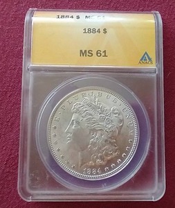lot 103 image: 1884 Morgan Dollar - ANACS MS61