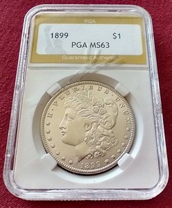lot 108 image: Awesome Low Mintage 1899 Morgan Dollar - PGA MS63