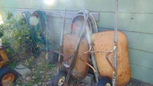 lot 15 image: 2- Wheel Barrows with Lot of Water Hoses