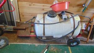 lot 25 image: Pull Behind Yard Sprayer, Trailer is an old 2 Wheeler Cart.