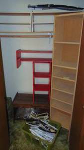 lot 111 image: Contents of Closet, includes Shoe Racks, Shelf and Hangers plus More