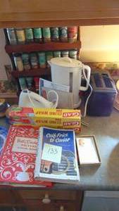 lot 133 image: Toaster, Hand Mixer, Hot Water Pot, Cookbooks, Spice Rack and Misc