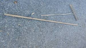 lot 20C image: Primitive Wood Rake and Primitive Tree Cutter