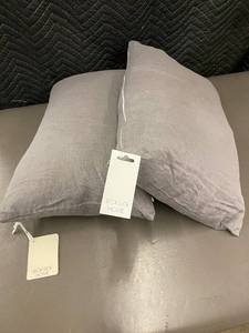 lot 32 image: Pair of Slate French Linen Throw Pillows, 15 x 22 Inches