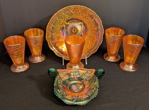 lot 53 image: K - Vintage Iridescent Carnival Glass Set with 4 Tumblers, Large Plate, and Butterfly Bowl