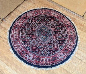 lot 59 image: ML - Round Oriental-Style Area Rug with Fringe, 40 Inch Diameter