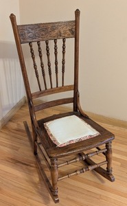 lot 82 image: ML - Antique Wooden Rocking Chair with Carved Floral Backrest